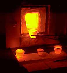 Figure 7  Möng Hsu rubies emerging red-hot from the Mae Sai oven of Somkual Plylaharn; June 1997. (Photo: R.W. Hughes) 